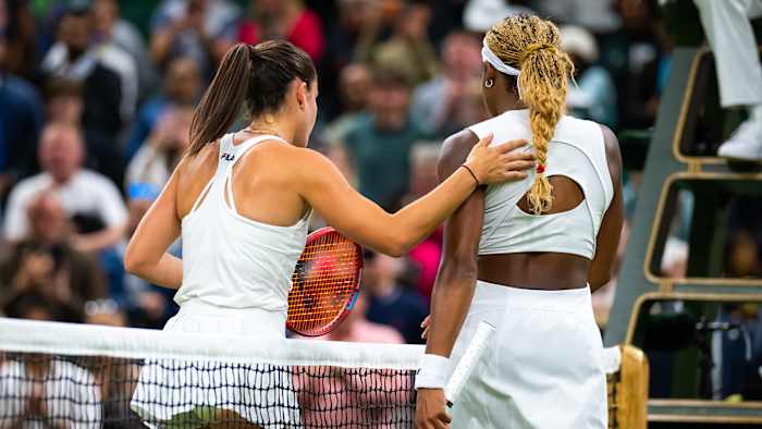 LONDON, ENGLAND - JULY 07: Emma Navarro of the United States and Coco Gauff of the United States embrace at the net after the fourth round on Day Seven of The Championships Wimbledon 2024 at All England Lawn Tennis and Croquet Club on July 07, 2024 in London, England (Photo by Robert Prange/Getty Images)